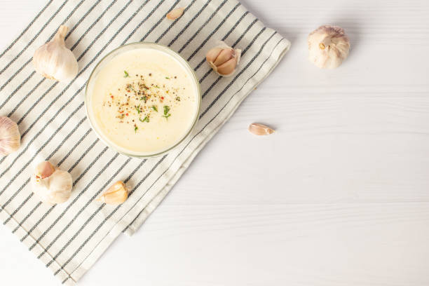 garlic sauce on a white table. Universal garlic sauce.