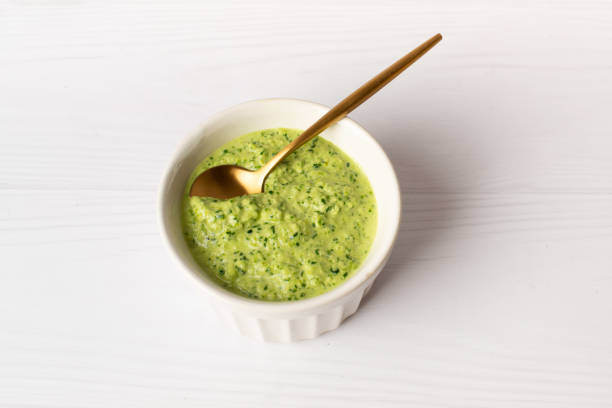 istock spinach sauce with lemon and garlic on a white background 1370280597