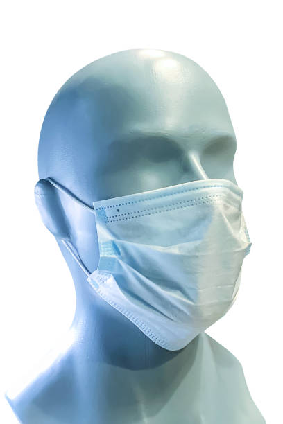istock Mannequin head with protective medical mask isolated on a white background. COVID-19 protection concept 1370286881