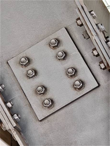 istock Row of Screws or Bolts on The Pole 1370288633
