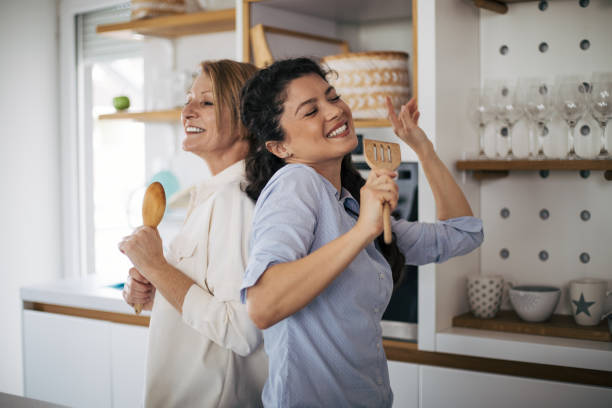 istock Mother and daughter enjoying in the kitchen. 1370294823