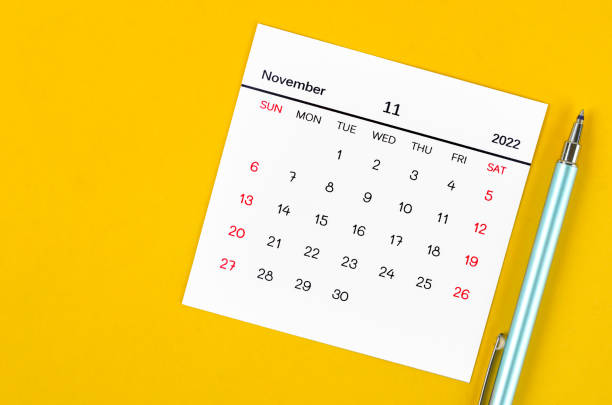 istock November 2022 calendar on yellow background. 1370297940