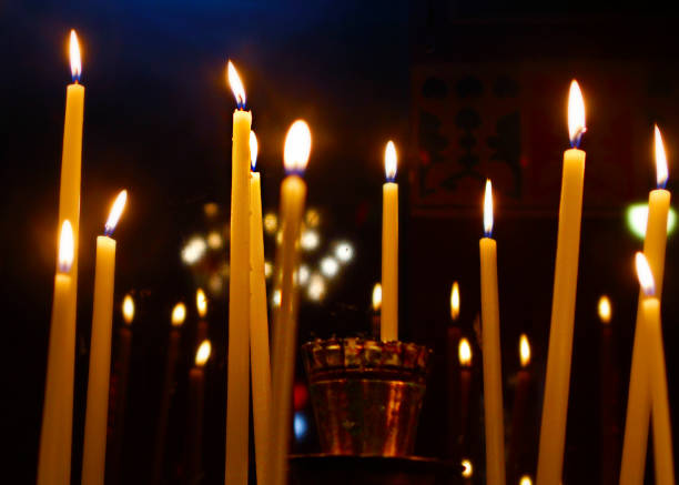 istock Candles in church 1370301528