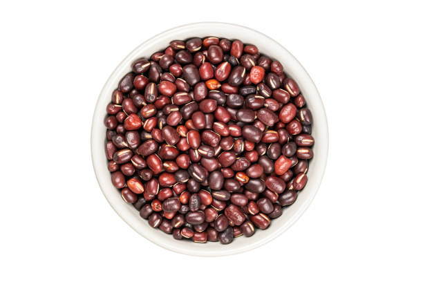istock Top view (flat lay) of red beans in white ceramic cup. 1370305189