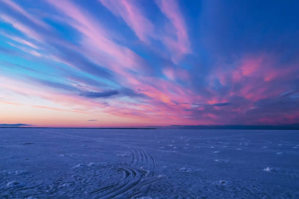 istock violet blue sunset in the evening in winter over the river 1370305304
