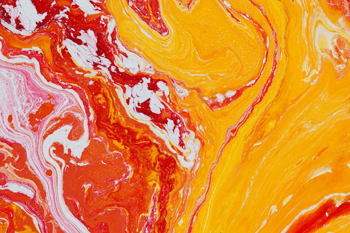 Abstract background. Swirls of marble. Natural Luxury. Red and yellow paint background