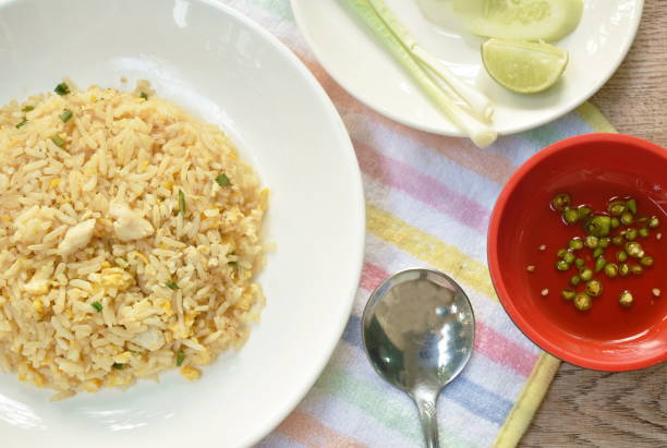istock fried rice crab meat and egg with slice cucumber couple lemon 1370306404