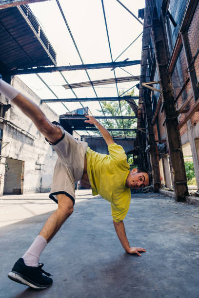 istock Parkour man exercise handstand outdoors 1370308229