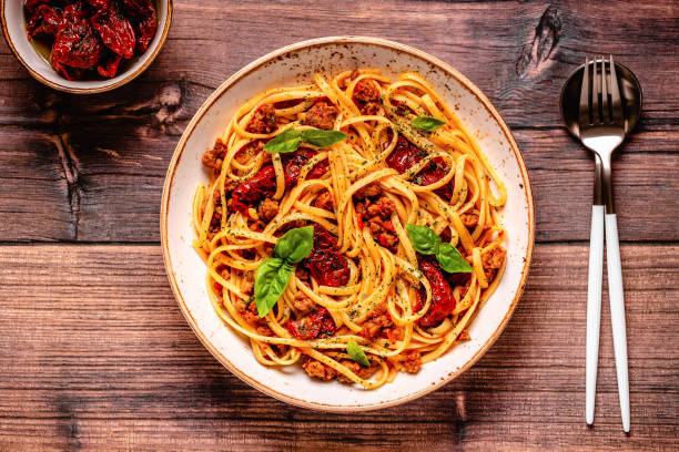istock Pasta with bolognese sauce and sun-dried tomatoes 1370311308