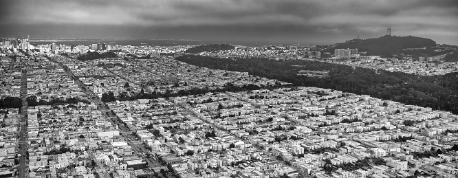 Aerial view of San Francisco outskirts from helicopter, homes and streets