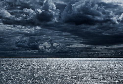 Toned Photo of a Sea Landscape with the Dramatic Clouds