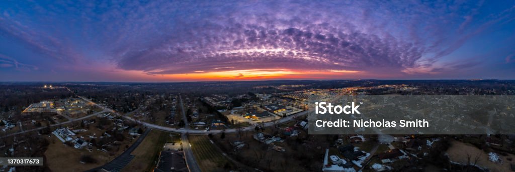 180 Degree Suburban Sunset Panorama A 180 degree aerial panorama via drone of the sunset over a suburban area outside of Dayton, Ohio in January Ohio Stock Photo