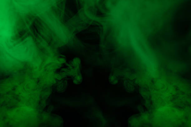 istock Green steam on a black background. 1370320031