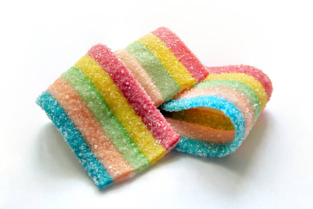 marmalade candy in the form of a ribbon of rainbow colors marmalade candy in the form of a ribbon of rainbow colors. High quality photo chewy photos stock pictures, royalty-free photos & images