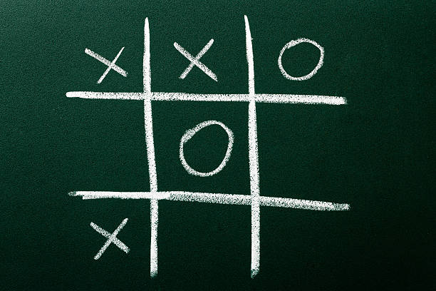 istock Tic-Tac-Toe game on green blackboard 137032448