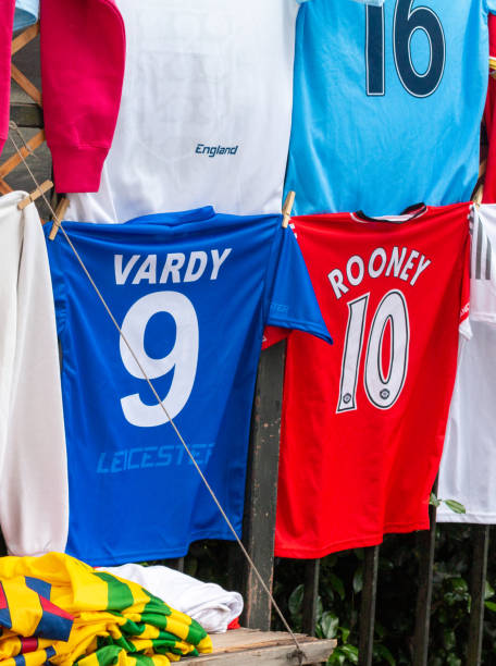 Jamie Vardy and Wayne Rooney Soccer Shirts in City of Westminster, London Soccer shirts commemorating former Leicester City footballer Jamie Vardy and former Manchester United champion Wayne Rooney. Their wives Rebekah Vardy and Coleen Rooney are currently involved in a court libel case in the UK, over private information allegedly leaked from Colleen Rooney's social media. wayne rooney stock pictures, royalty-free photos & images