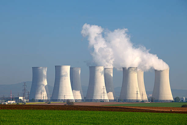 istock A large nuclear power plant, puffing out white smoke 137033038