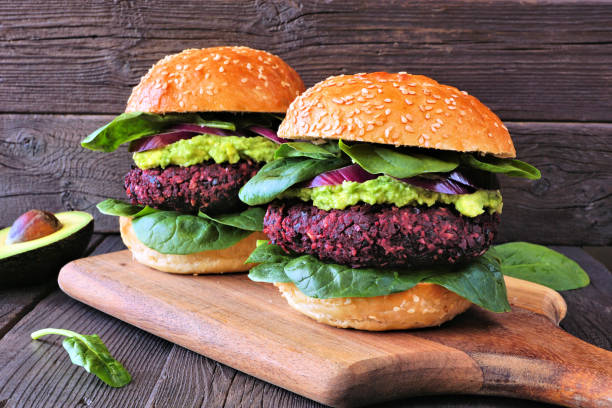 istock Healthy plant based beet burgers with avocado and spinach 1370332159