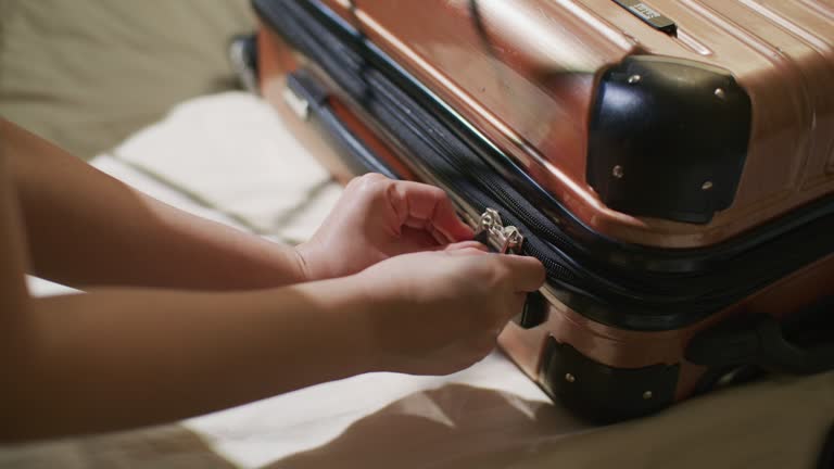 Woman packing her suitcase