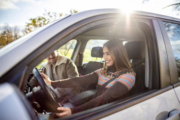 istock Young couple traveling by car 1370335114