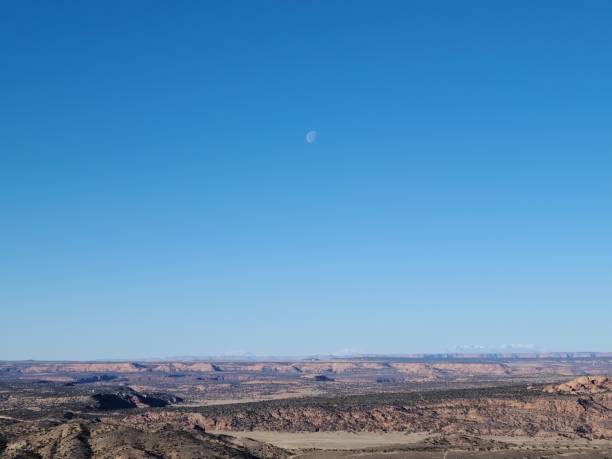 istock Moon over the Moab Desert, Utah 1370336707