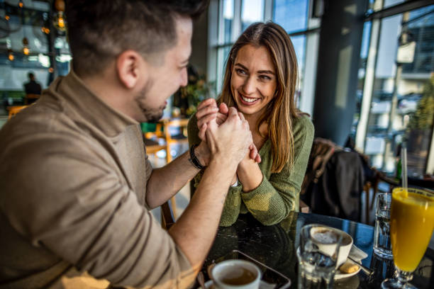 istock Young couple having date in a Cafe 1370336808