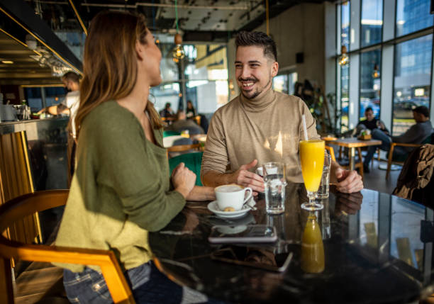 istock Happy young couple in cafe 1370337010