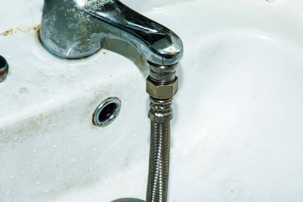 istock Water meter verification process. A flexible water hose is connected to the water tap. Water saving concept 1370337775