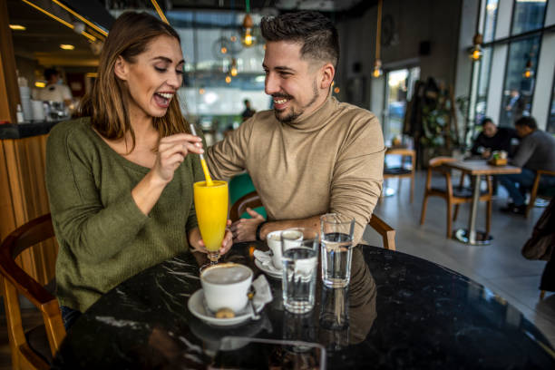 istock Happy young couple in cafe 1370338062