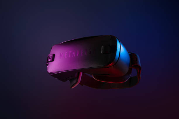 istock Metaverse. Future game and entertainment digital technology. VR virtual reality glasses isolated on dark blue purple background. 1370338469