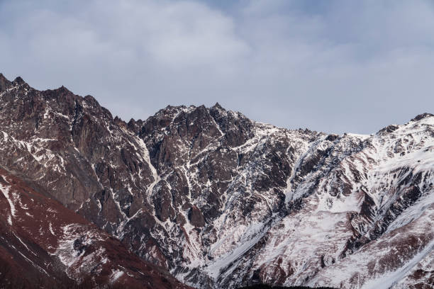 Beautiful winter mountains landscape. High snow covered rocks.