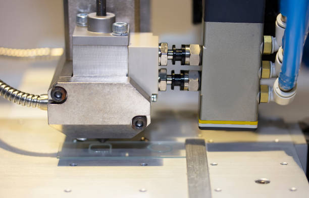 istock Close up High precision and technology of nozzle device and needle of automatic glue dispenser machine (glue injection) 1370346660