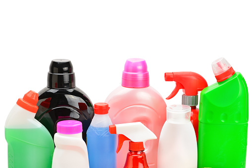 Collection of various household cleaning products isolated on a white background. free space for text.