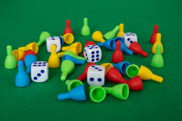 istock Playing dice and chips on the green table. Play, leisure. 1370353618