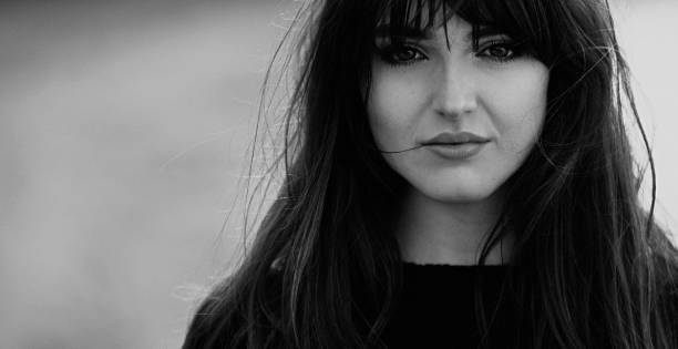 istock young beautiful woman monochrome portrait 1370354523