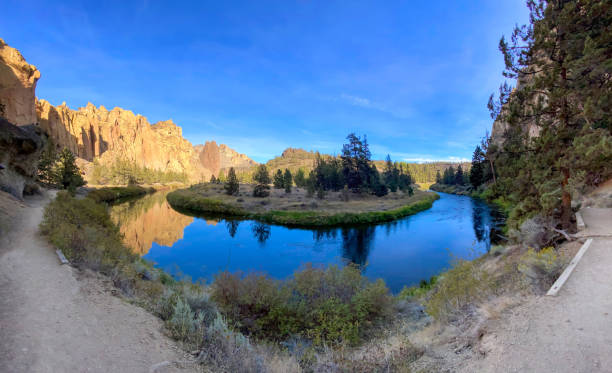 istock Beautiful mountain reflections in Crooked River in Smith Rock State Park 1370360500