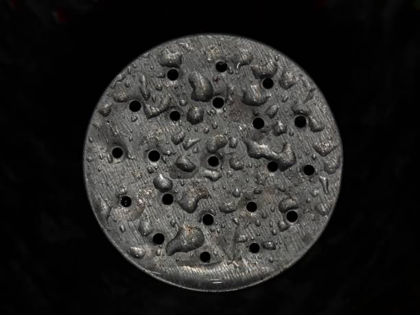 Metal Water Can Spout & Water Droplets.