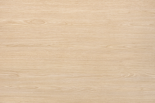 Light natural wood texture. The board have a strong clear texture of wood without damages. A wood grain pattern featuring even grains of wood running horizontally across the image.