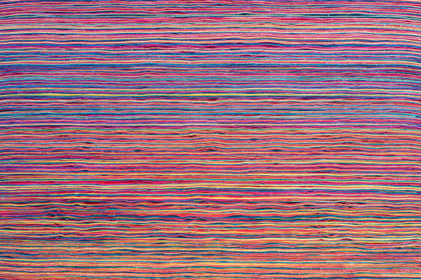 istock Close-up of multi-colored canvas fabric textures art background. 1370367104