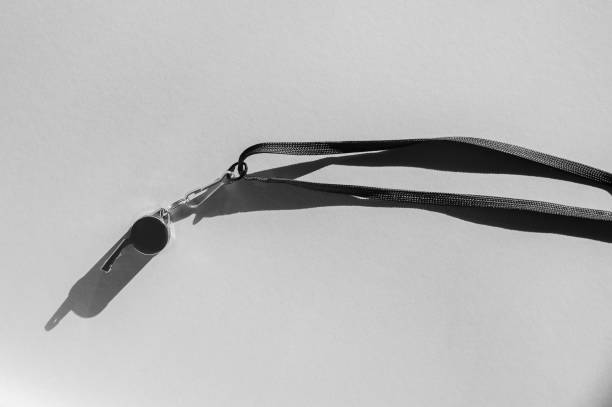 istock Sports whistle on grey background. Concept - sport competition, referee, statistics, challenge. Basketball, handball, futsal, volleyball, soccer, baseball, football and hockey referee whistle 1370368078
