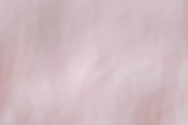 Pink folded blurred abstract background suitable for tender delicate intimate female design and themes