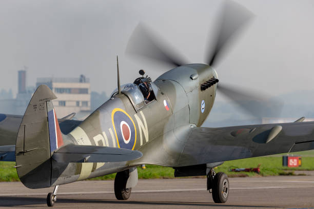 Supermarine Spitfire World War II fighter aircraft taxiing at Payerne Airport. Payerne, Switzerland - September 6, 2014: Supermarine Spitfire Mk16e World War II fighter aircraft G-MXVI taxiing at Payerne Airport. spitfire stock pictures, royalty-free photos & images