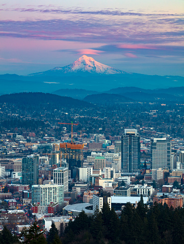 Alpenglow on Mt Hood with downtown Portland in the foreground.