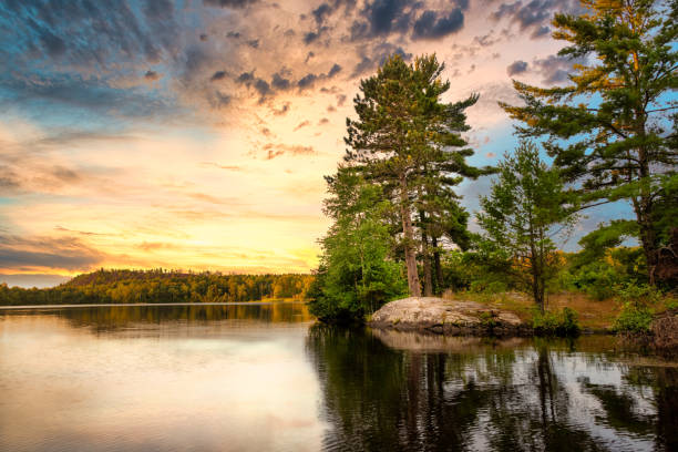 sunset over beautiful lake minnesota - multi colored sunset north america usa imagens e fotografias de stock