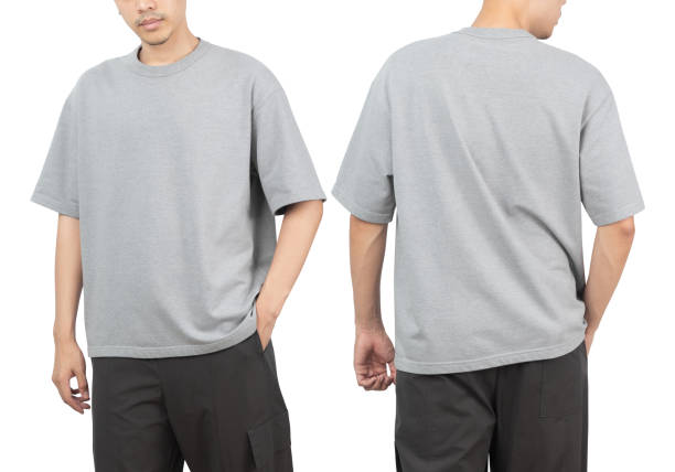 istock Young man in grey oversize t-shirt mockup front and back used as design template, isolated on white background with clipping path 1370390376