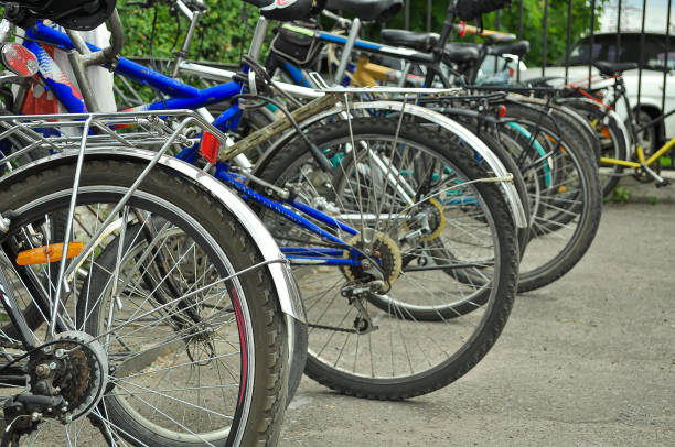 istock Bicycle parking, row of bicycles perspective, wheel close up. Selective focus 1370391068
