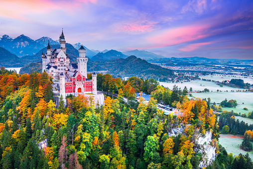 Neuschwanstein Castle, Bavaria - October 2021: Idyllic Germany in beautiful autumn colors, Fussen province and Bavarian Alps.