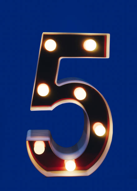 istock Illuminated shining number five 5 at isolated background 1370400256