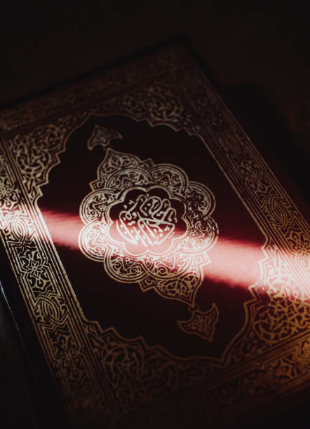 istock Close up holy Quran Arab Muslim book 1370401084