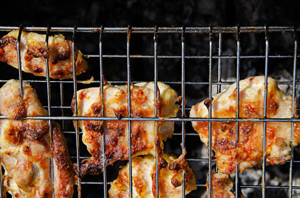 istock Shish kebab is cooked on a grid. Apetite, fried meat. Ready-made meat dish. 1370401346